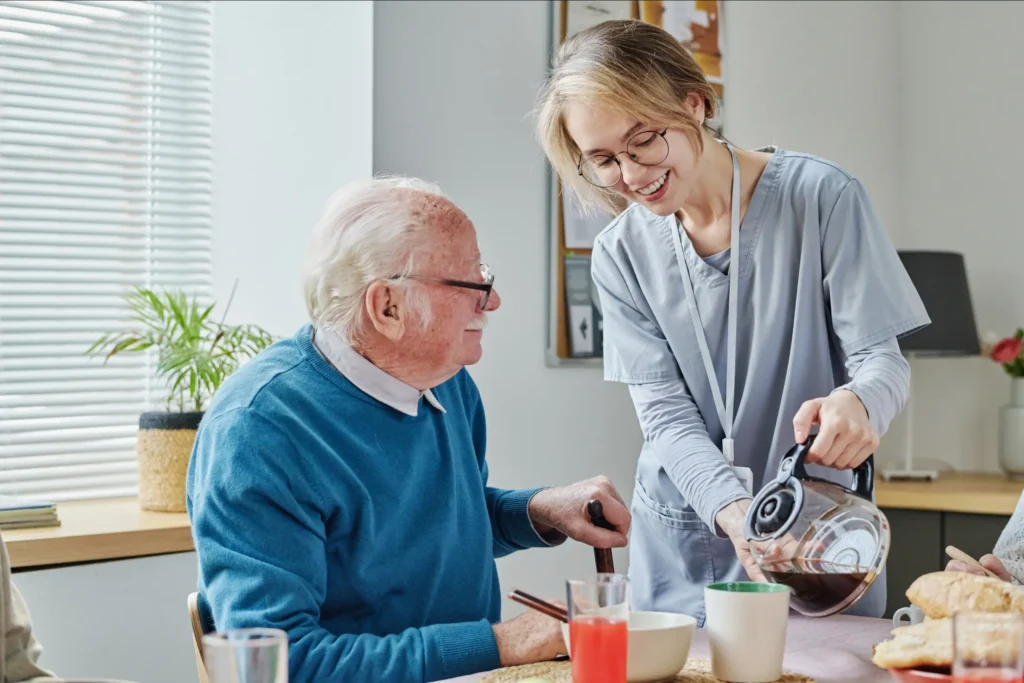 Caring in-home caregiver assisting elderly man with his morning routine in Washington County, Maryland