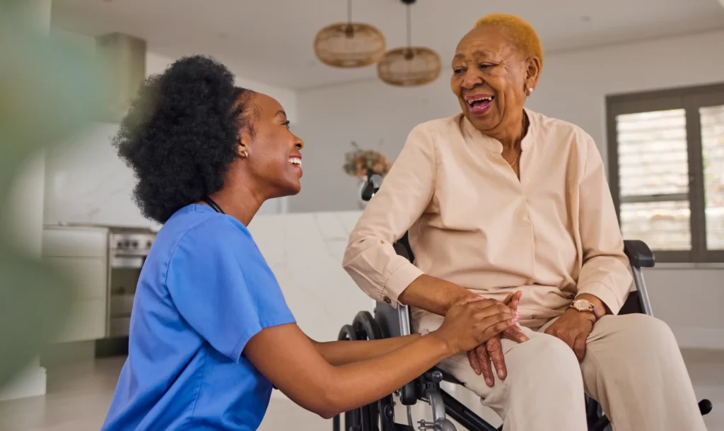 Compassionate nurse assisting a senior patient in a wheelchair in Washington County, Maryland.