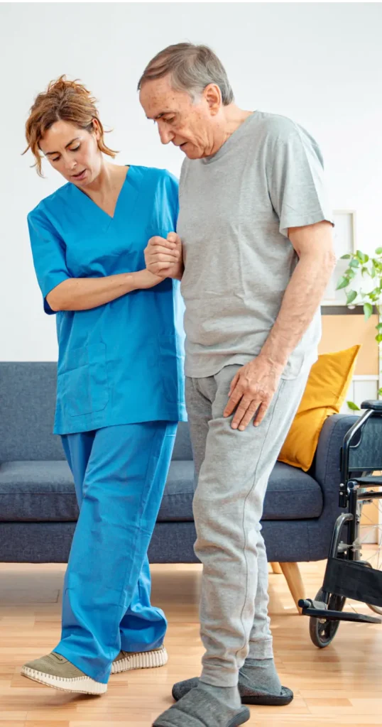 A dedicated caregiver assisting a senior man in a wheelchair in Montgomery County, Maryland.