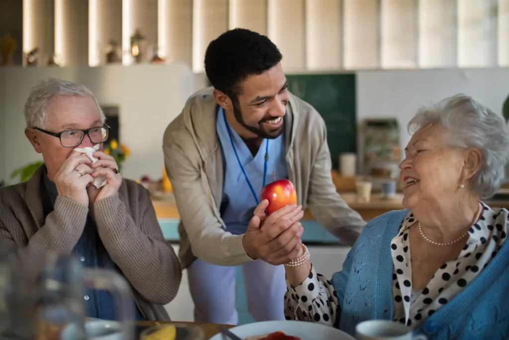 Family education and support for dementia care with smiling elderly couple enjoying breakfast in Washington County, Maryland